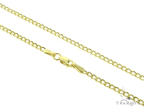 2mm 10k yellow gold curb chain 22 inches – flat interlocking links on a neutral background