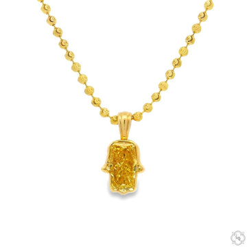 Yellow gold diamond-studded Hamsa pendant on a textured gold chain necklace.