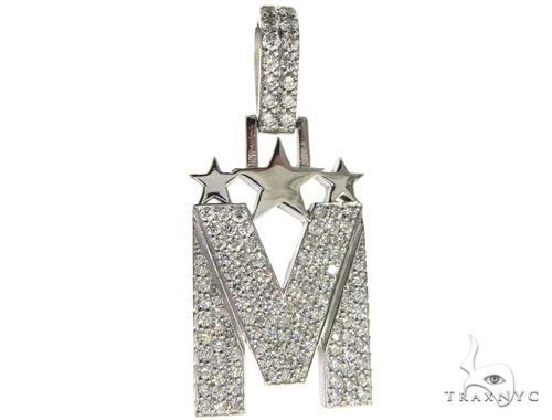 White gold initial M pendant adorned with diamonds and star accents