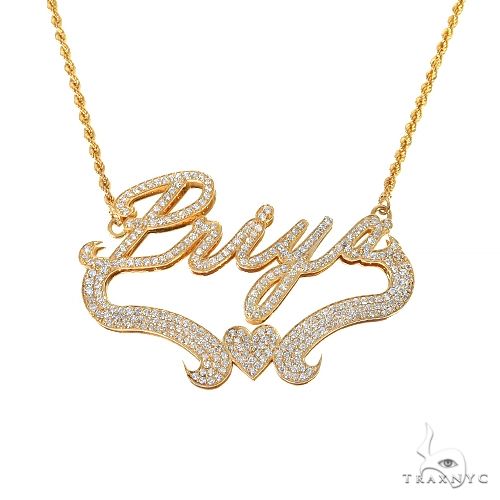 Custom diamond name pendant in yellow gold – round-cut diamonds set across personalized block lettering, front view
