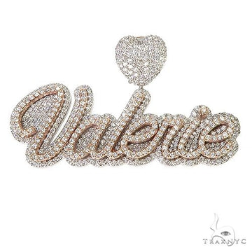 Custom diamond name pendant in gold with pavé-set diamonds across script lettering, front view