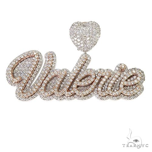 Custom diamond name pendant in gold with pavé-set diamonds across script lettering, front view