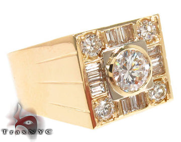 Yellow gold men's diamond ring with baguette and round-cut diamonds in square setting.