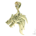 Yellow gold pendant shaped like a fierce firewolf head with sharp detailing and polished finish.
