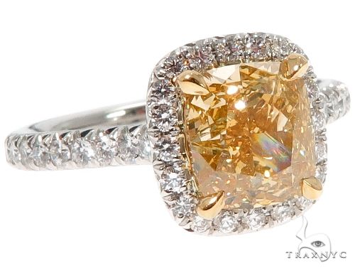 A fancy yellow diamond in a halo