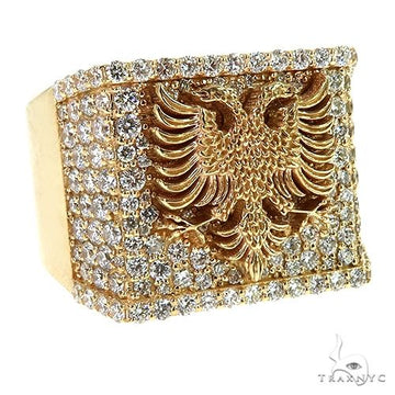Yellow gold men's ring with Albanian eagle and diamond accents.