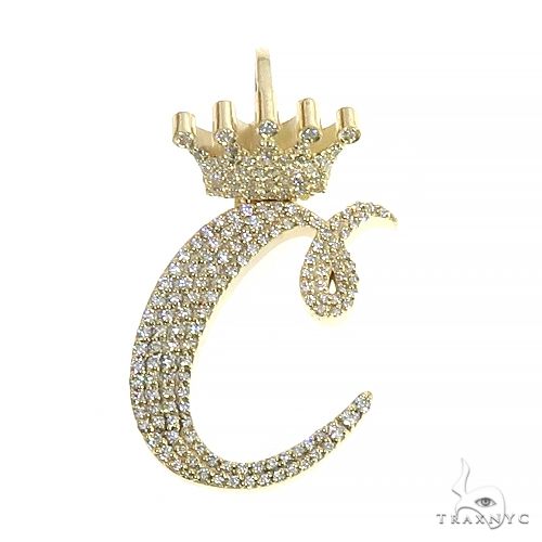 Custom 'C' initial diamond crown pendant, yellow gold setting, front view showing crown detailing and pavé diamond coverage