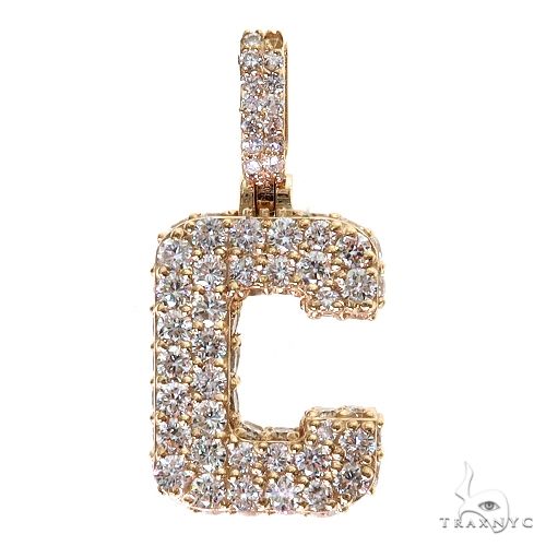 Yellow gold 'C' initial pendant encrusted with sparkling clear stones, bold design