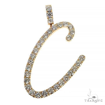 Yellow gold initial pendant C encrusted with round diamonds on a delicate bail.