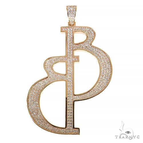 Rose gold diamond initial pendant with pave-set stones and vertical split design