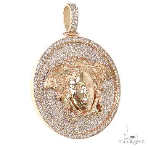 Rose gold Medusa pendant encrusted with diamonds, detailed face and circular border design
