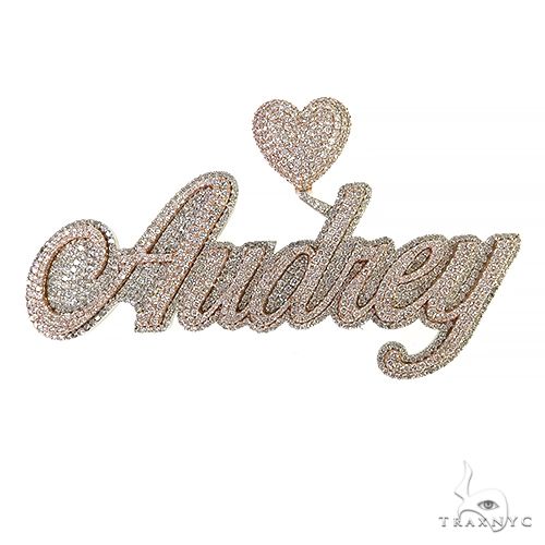 Custom diamond name pendant in 10k two-tone yellow and white gold with diamond-set lettering, front view