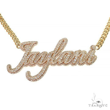 Yellow gold custom name pendant encrusted with diamonds on a matching chain.