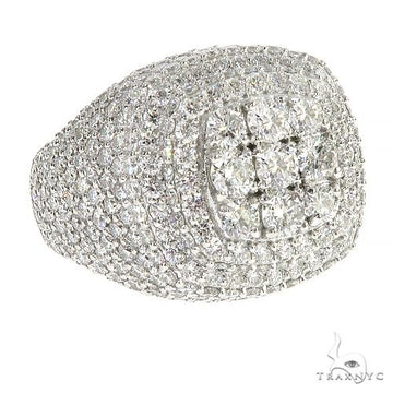 Men's custom diamond ring in white gold with pavé and cluster diamond setting.