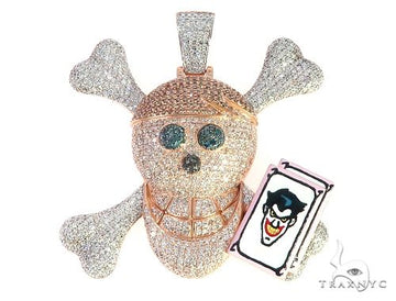 Custom diamond skull pendant in gold-tone metal – front-facing view with round-cut diamonds set across skull face