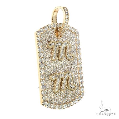 Yellow gold dog tag pendant with diamond-encrusted border and custom 'MM' initials