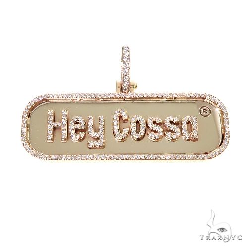 Custom diamond pendant in 14k yellow gold with round-cut diamonds across the face, front view
