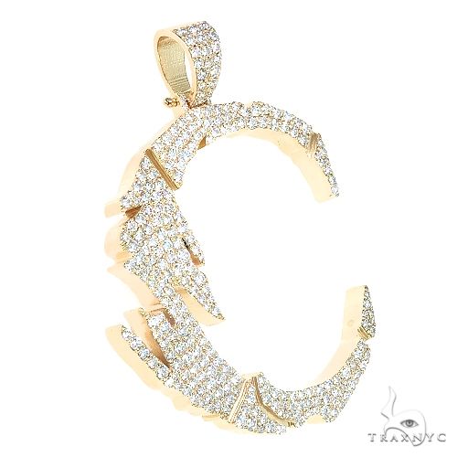 Yellow gold initial C pendant encrusted with sparkling round diamonds