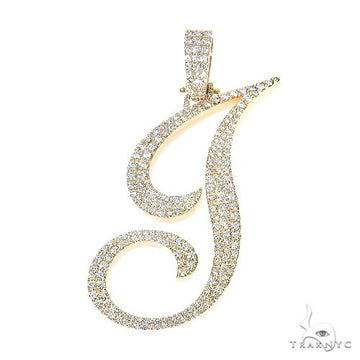 Yellow gold diamond-encrusted initial J pendant with intricate swirls and sparkling stones.