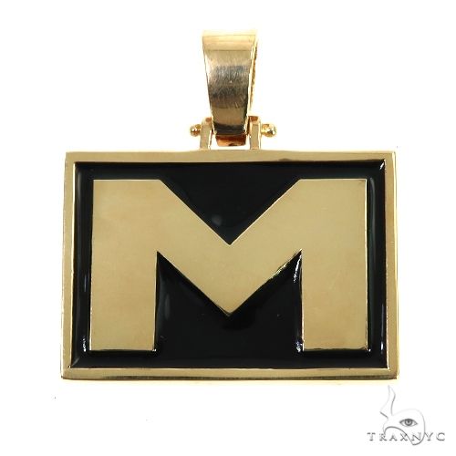 Yellow gold rectangular pendant with black enamel background and bold initial M