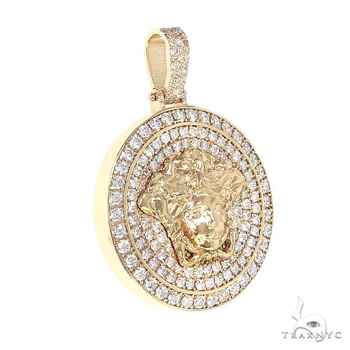 Yellow gold round Medusa head pendant with triple diamond halo detail