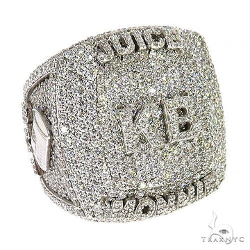 Men’s custom white gold KB diamond ring with engraved lettering and square top design.