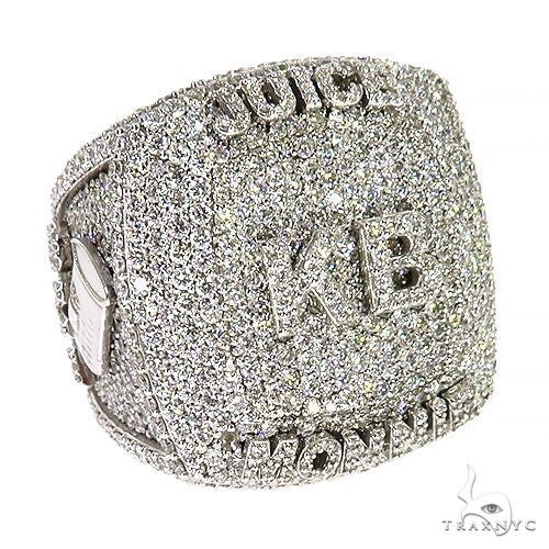 Men’s custom white gold KB diamond ring with engraved lettering and square top design