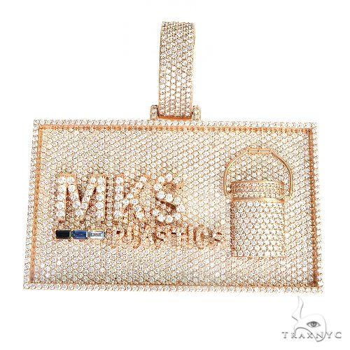Custom MKS logo diamond pendant, yellow gold setting – front-facing view of hand-set lettering with stone detail