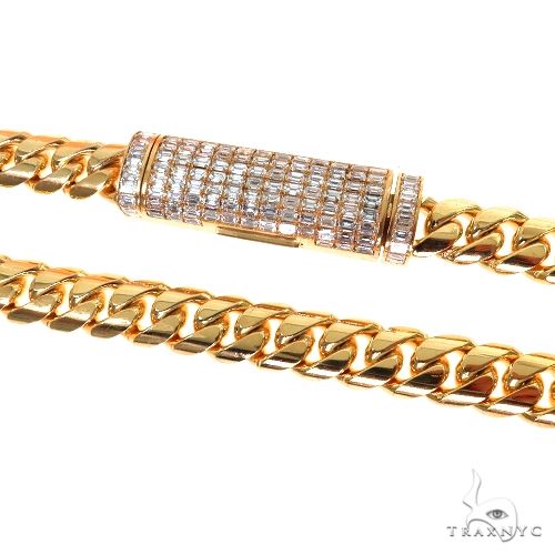 12mm Miami Cuban link chain with emerald-cut lock clasp, polished gold finish, close-up front angle