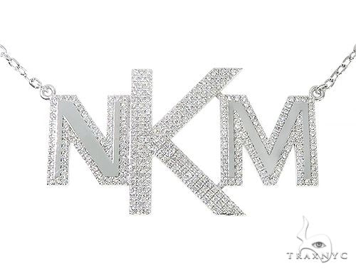 Custom diamond initial pendant in 14k white gold – front view of round-cut letter face