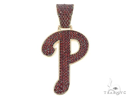 Custom P initial pendant in 14k yellow gold with garnet stone, front-facing view
