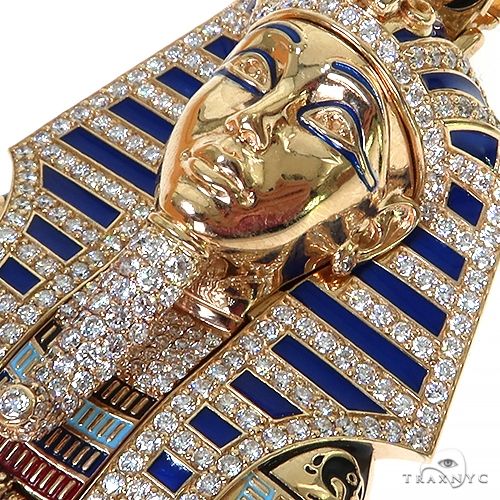 Rose gold pharaoh pendant with blue enamel and diamond accents, featuring detailed facial features