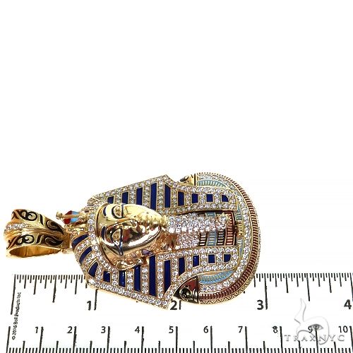 Yellow gold Pharaoh pendant with blue enamel and diamond accents, measuring about 3 inches long