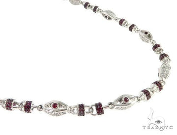 Custom ruby and diamond chain in 10k white gold – prong-set round stones, front-facing detail view