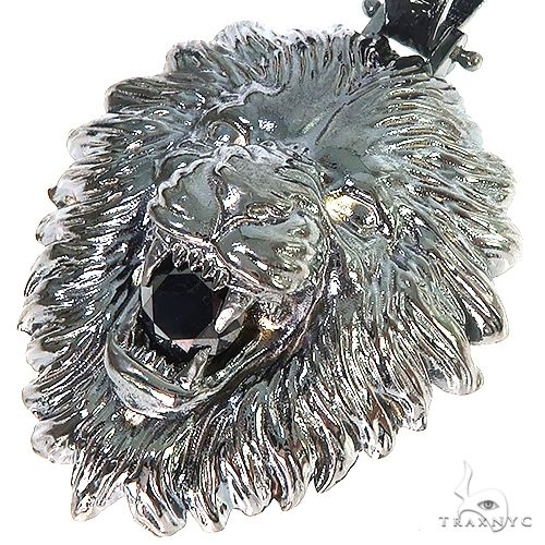Silver black rhodium lion head pendant with detailed mane and black onyx eye gemstone