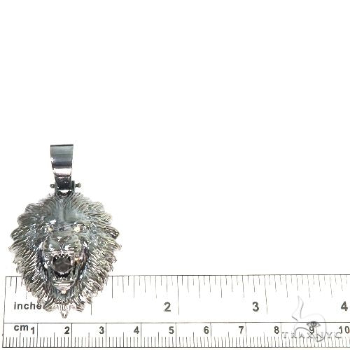 Silver black rhodium lion head pendant with detailed mane and fierce expression, hanging bail