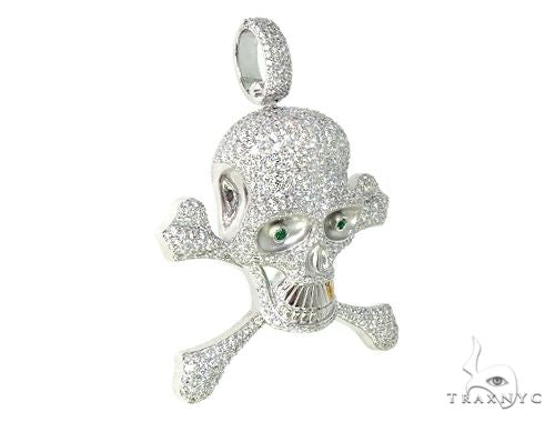 White gold skull and crossbones pendant encrusted with diamonds and green gemstone eyes