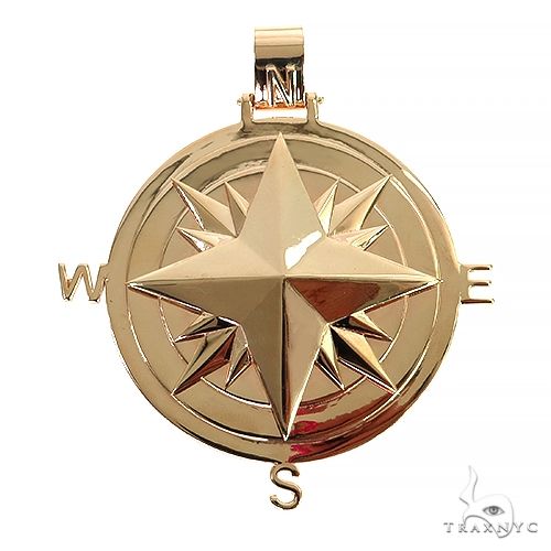 Custom solid compass pendant in 14k gold — front-facing view showing directional dial detail