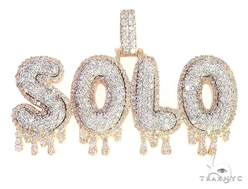 Custom made solo name pendant in yellow gold – front-facing flat lay showing single word cutout lettering