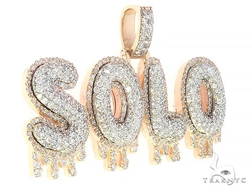 Yellow gold pendant spelling "SOLO" with diamond accents and dripping design details
