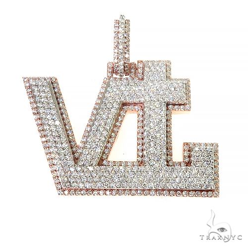 Custom VTL diamond pendant in 14k yellow gold – round-cut diamonds set across letter silhouette, front view