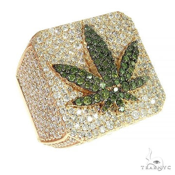 custom weed leaf diamond ring with round cut diamonds set across sculpted leaf motif – top-down angle