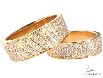 Custom micro-pave diamond fingerprint ring set – paired bands with edge-to-edge stone coverage, top-down view