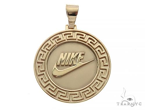 Custom Nike logo pendant in yellow gold – front-facing flat profile view