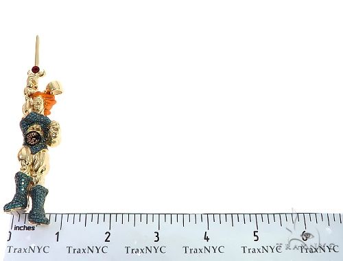 Yellow ThunderCats lion pendant with detailed mane and gemstone accents, on measuring ruler