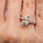 Diamond ring with a heart-shaped center stone