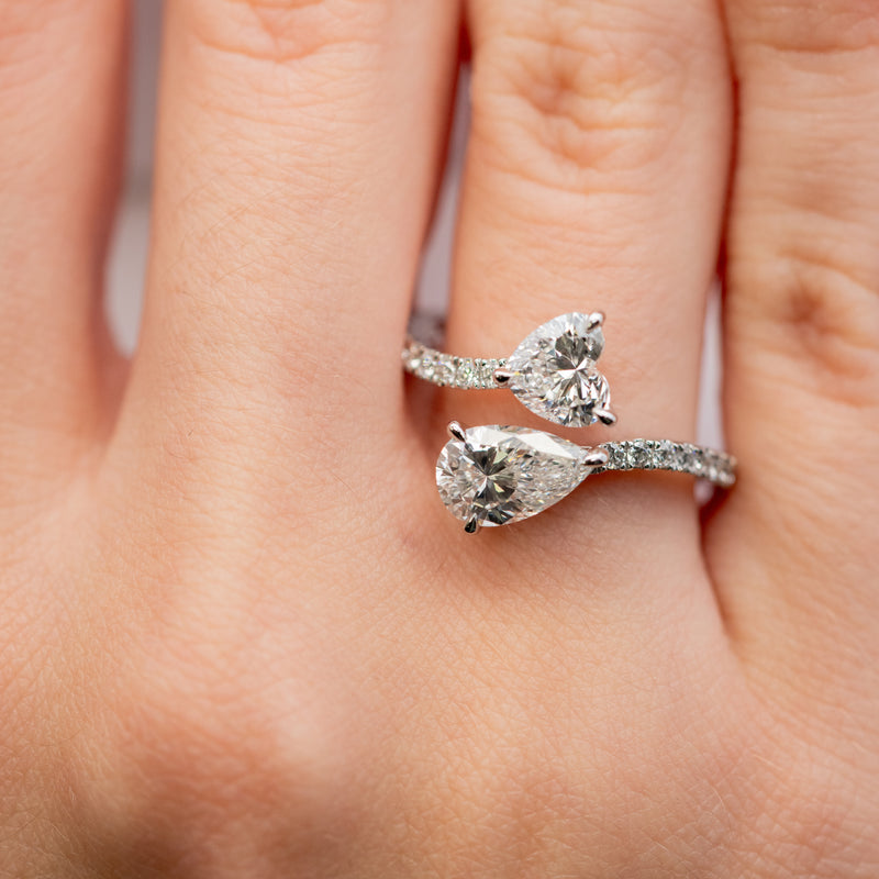 Diamond ring with a heart-shaped center stone