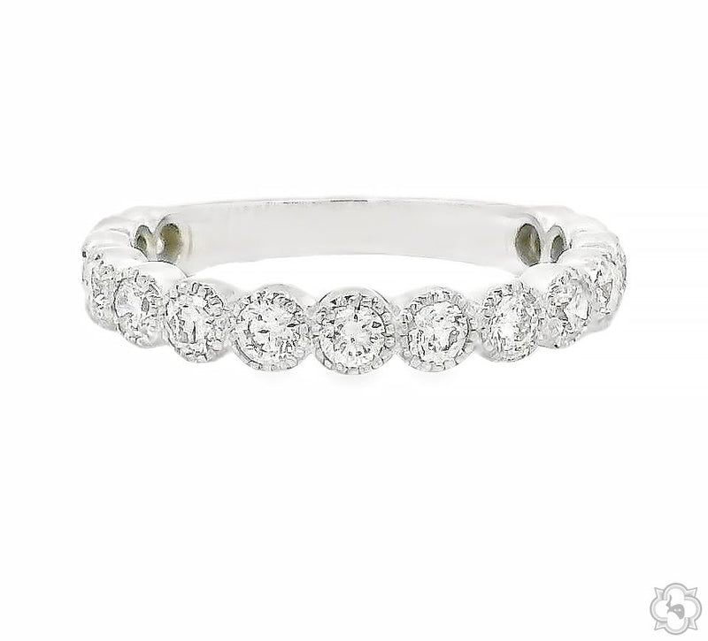 White gold 2.5mm diamond bezel band ring with round diamonds in halo settings