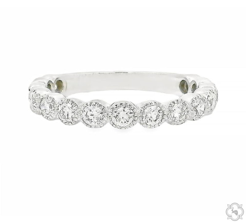 White gold 2mm diamond bezel band ring with round-cut stones in a delicate setting