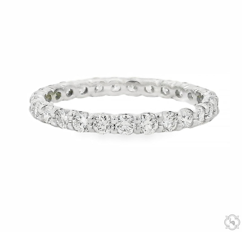 White gold diamond eternity band with round-cut stones all around the slender band